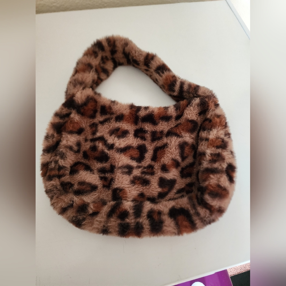Mini Leppard plush purse.